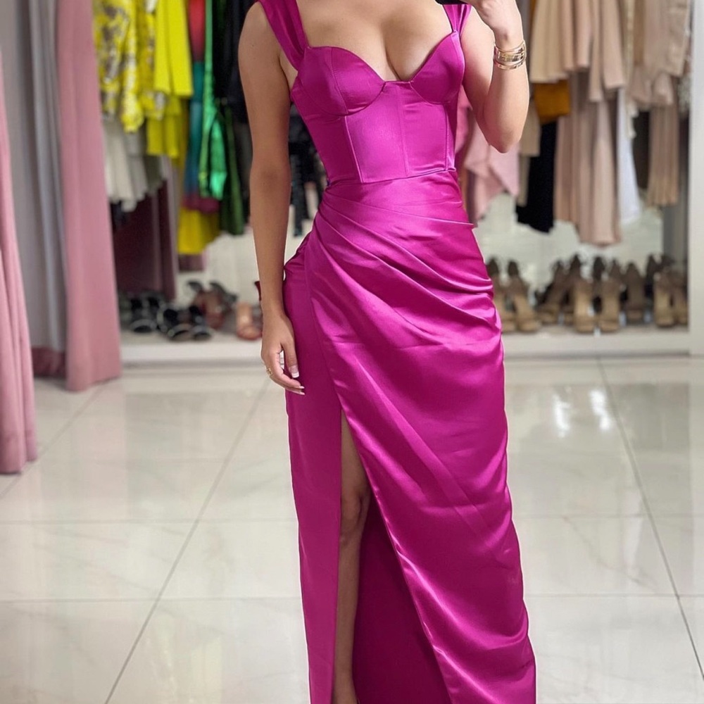 Fuchsia dress from small boutique. New with tags. Never been worn!